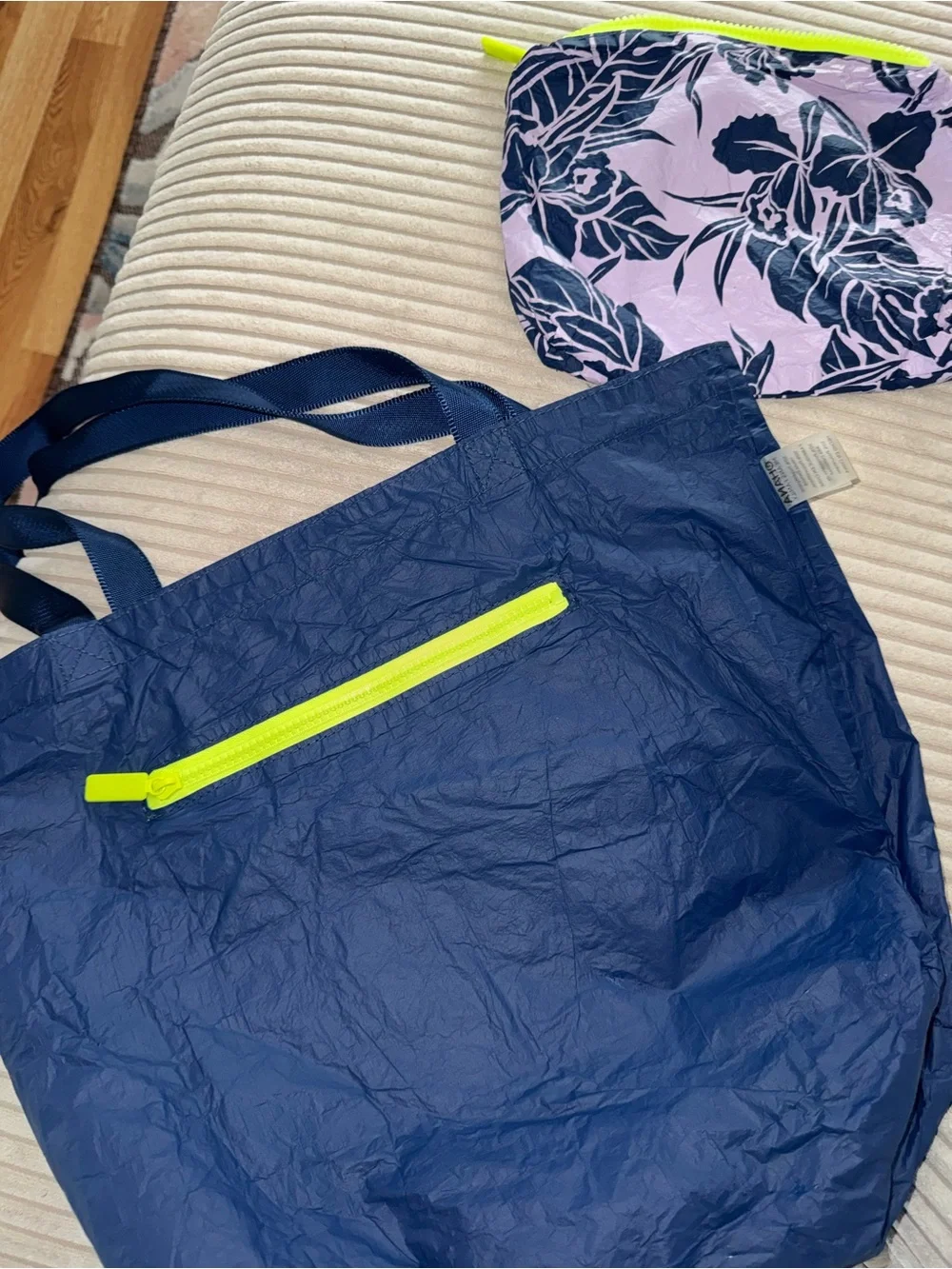 ALOHA Collection reversible navy tote with lime logo and matching pouch